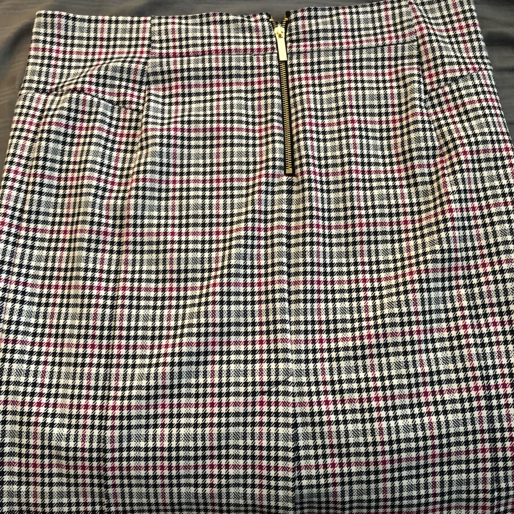 Brand new Michael Kors with tag skirt sizeXL zipper and slit on back of skirt